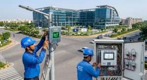Field technicians maintaining IoT infrastructure in an Indian smart city.